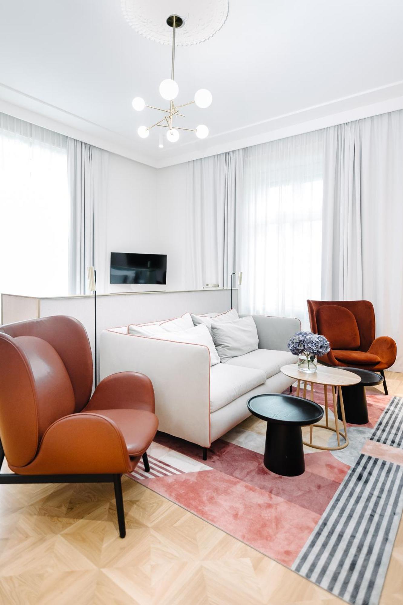 Hotel Altus Palace - Destigo Hotels Breslávia Quarto foto A living room at the Hotel